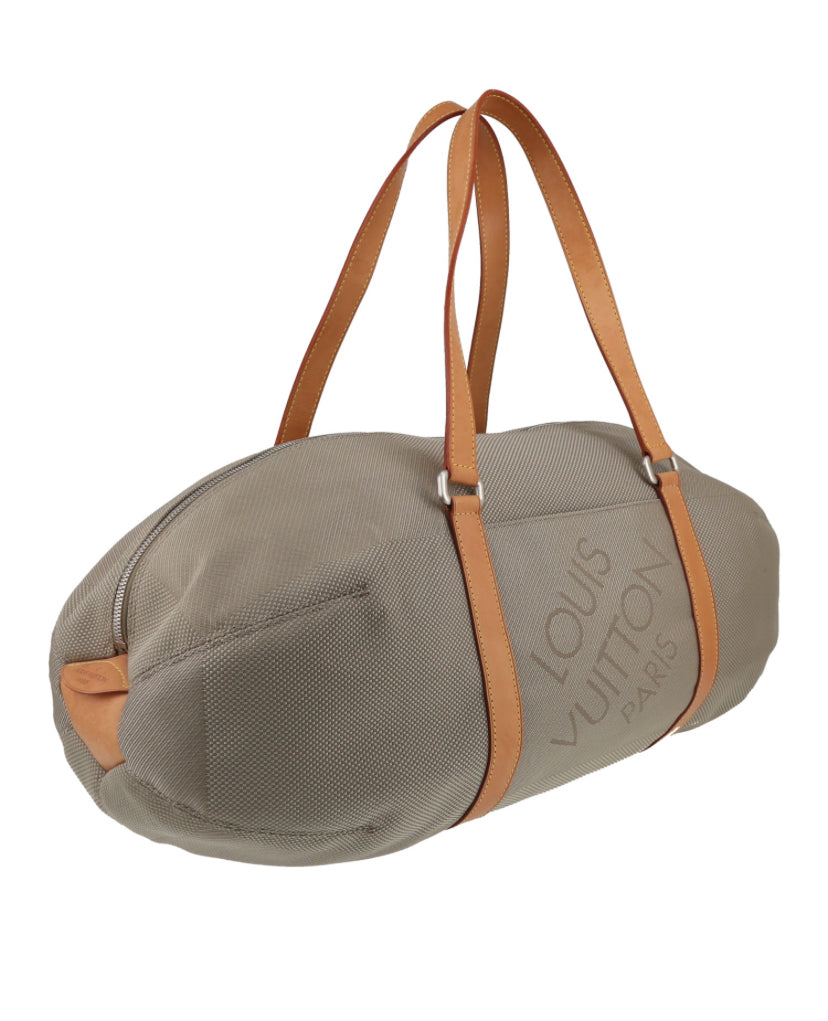 Borsa da viaggio Louis Vuitton Attaquant in tela beige e pelle naturale